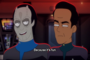 Garak in a medical uniform with Holo-Bashir next to him. Caption: Because it's fun.